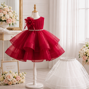 Royavelle wine red organza princess party dress  in an elegant setting withwhite petticot
