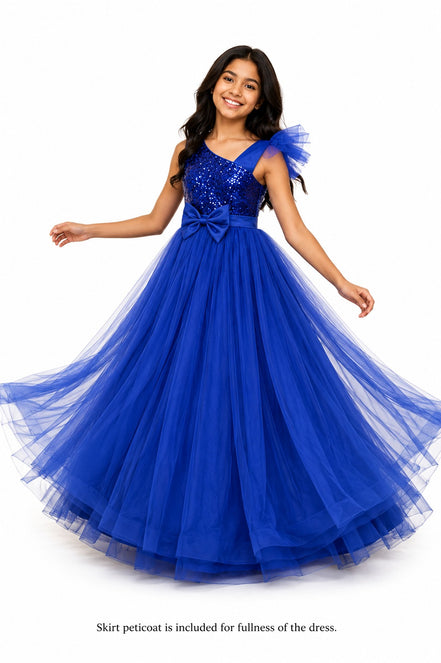 Woman wearing a blue evening gown with a bow detail on a white background