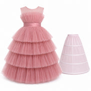 Pink tiered dress with a matching petticoat on a white background