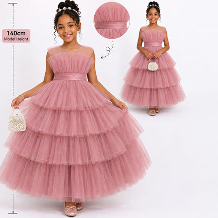 Young girl wearing a pink tiered dress with a close-up of the fabric and a measurement chart.
