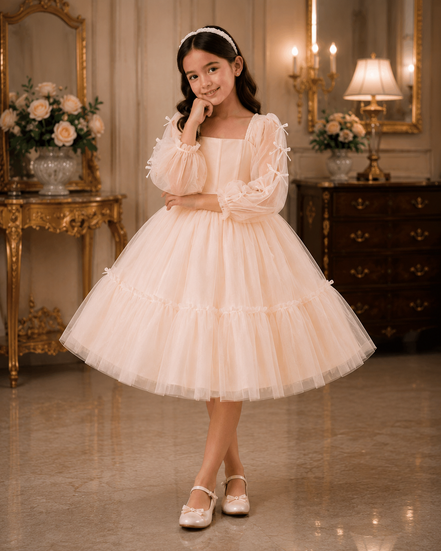 Young girl in a white dress standing in an elegant room with decorative furniture and flowers.
