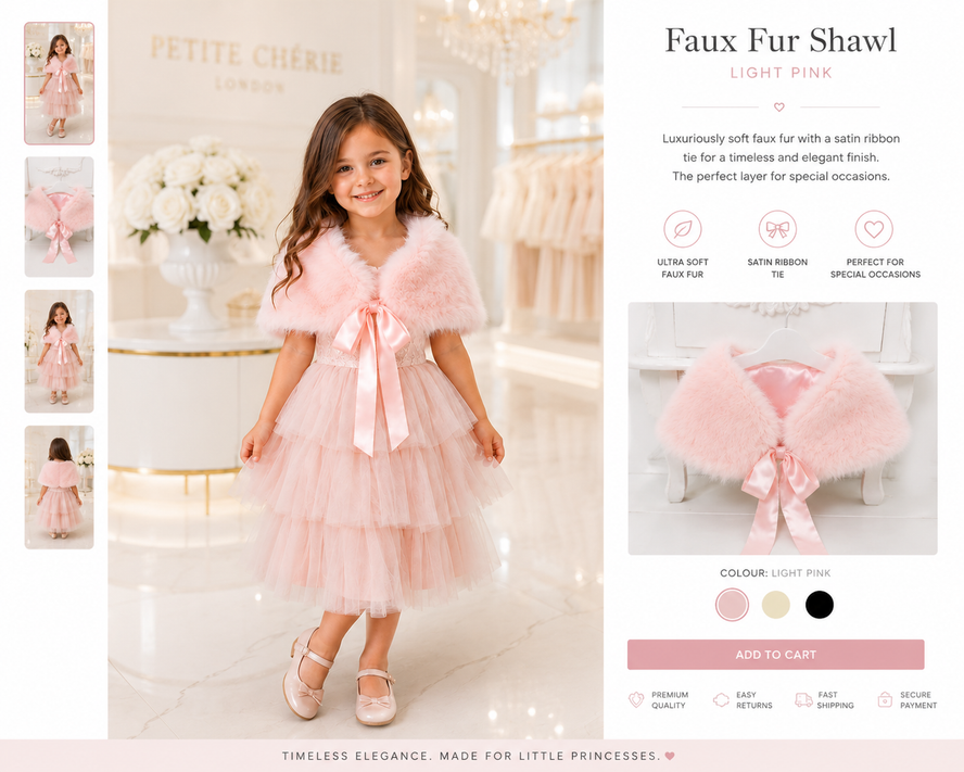 Young girl wearing a pink dress with a matching faux fur shawl in a store setting.