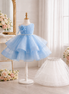 Light blue dress on a mannequin with a white background