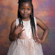 Girl wearing Royavelle Kids Luxury Sparkle Dress